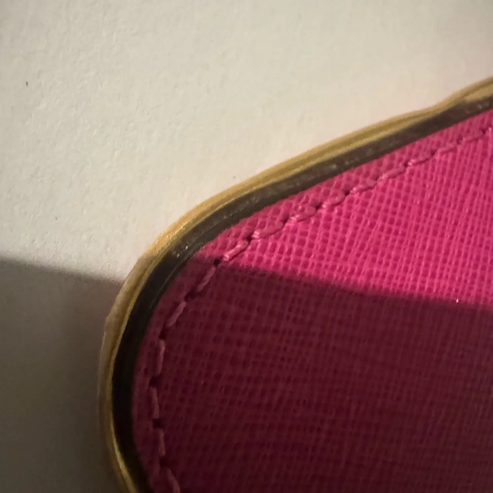 Michael Kors Fuchsia Wristlet with Gold Hardware